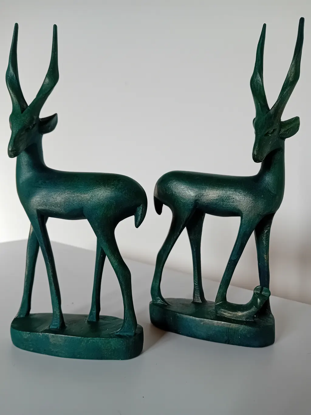 Antilopes — bronze vert ciré